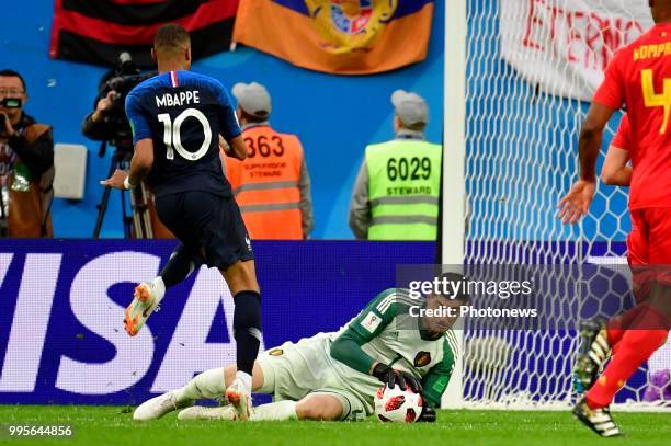 Kylian Mbappe forward of France & Thibaut Courtois goalkeeper of Belgium during the FIFA 2018 World Cup Russia Semi-Final match between France and...