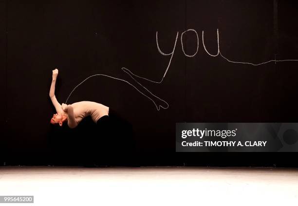 Dancers from Batsheva The Young Ensemble performs a scene from "Naharins Virus" during a dress rehearsal before opening night, July 10, 2018 at The...