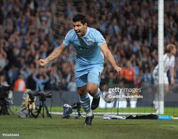 Sergio Aguero of Manchester City celebrates after scoring Mancheseter City's second goal during the Barclays Premier League match between Manchester...