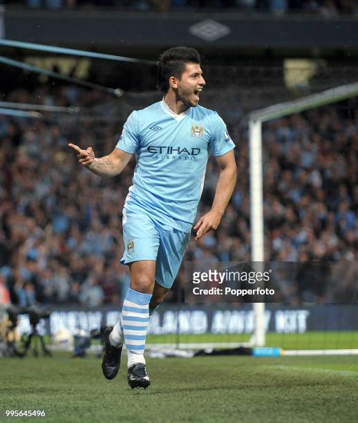 Sergio Aguero of Manchester City celebrates after scoring Mancheseter City's second goal during the Barclays Premier League match between Manchester...
