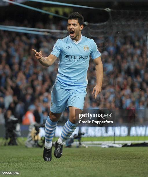 Sergio Aguero of Manchester City celebrates after scoring Mancheseter City's second goal during the Barclays Premier League match between Manchester...