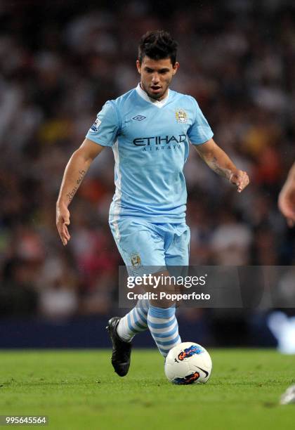 Sergio Aguero of Manchester City in action during the Barclays Premier League match between Manchester City and Swansea City at Etihad Stadium in...