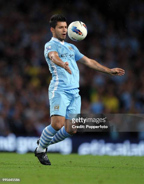 Sergio Aguero of Manchester City in action during the Barclays Premier League match between Manchester City and Swansea City at Etihad Stadium in...