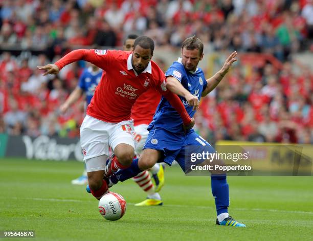 Richie Wellens of Leicester City and David McGoldrick of Nottingham Forest in action during the Championship match between Nottingham Forest and...