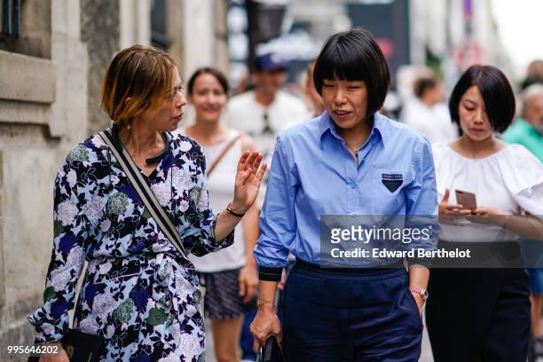 Angelica Cheung, Vogue China Editor in Chief, wears a blue shirt , outside Givenchy, during Paris Fashion Week Haute Couture Fall Winter 2018/2019,...