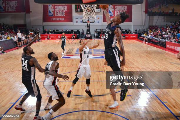 Lonnie Walker IV of the San Antonio Spurs goes to the basket against the Portland Trail Blazers during the 2018 Las Vegas Summer League on July 10,...