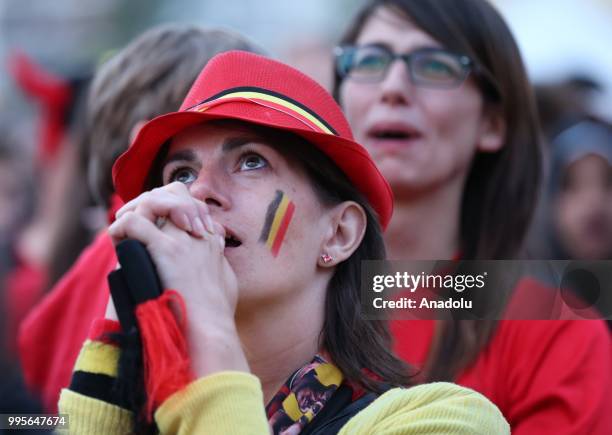 Fans gather for a public viewing event to watch 2018 FIFA World Cup Russia Semi Final match between France and Belgium on July 10, 2018 in Brussels,...