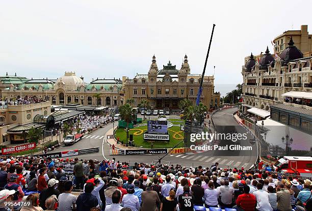 Jenson Button of Great Britain and McLaren Mercedes drives through Casino Square in the final practice session prior to qualifying for the Monaco...
