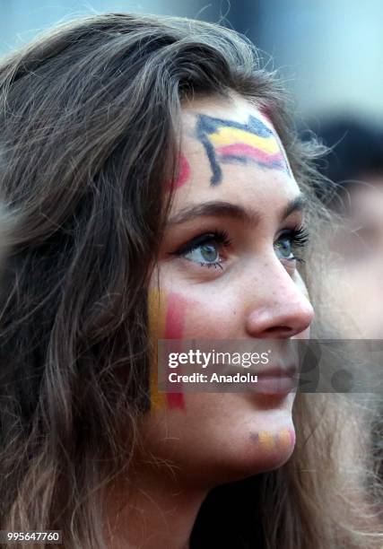 Fans gather for a public viewing event to watch 2018 FIFA World Cup Russia Semi Final match between France and Belgium on July 10, 2018 in Brussels,...