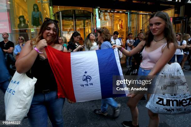 Fans gather for a public viewing event at Times Square to watch 2018 FIFA World Cup Russia Semi Final match between France and Belgium on July 10,...