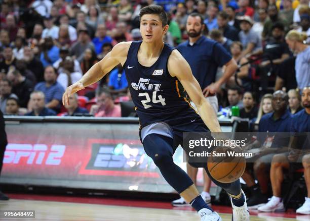 Grayson Allen of the Utah Jazz drives against the Miami Heat during the 2018 NBA Summer League at the Thomas & Mack Center on July 10, 2018 in Las...