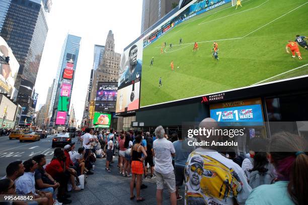 Fans gather for a public viewing event at Times Square to watch 2018 FIFA World Cup Russia Semi Final match between France and Belgium on July 10,...