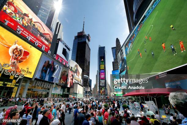 Fans gather for a public viewing event at Times Square to watch 2018 FIFA World Cup Russia Semi Final match between France and Belgium on July 10,...