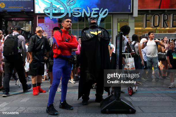 Fans gather for a public viewing event at Times Square to watch 2018 FIFA World Cup Russia Semi Final match between France and Belgium on July 10,...