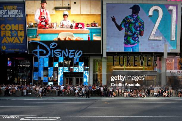 Fans gather for a public viewing event at Times Square to watch 2018 FIFA World Cup Russia Semi Final match between France and Belgium on July 10,...