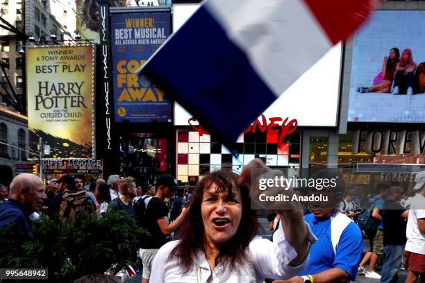 Fans gather for a public viewing event at Times Square to watch 2018 FIFA World Cup Russia Semi Final match between France and Belgium on July 10,...