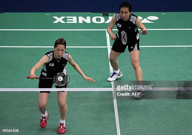 South Korea's Lee Kyung Won and teammate Lee Hyo Jung play against China's Du Jing and Yu Yang during their Uber Cup badminton championship final...