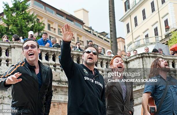 Actors of the movie "Robin Hood" Kevin Durand, Russell Crowe, Scott Grimes and Alan Doyle perform a concert on the Spanish Steps during their visit...
