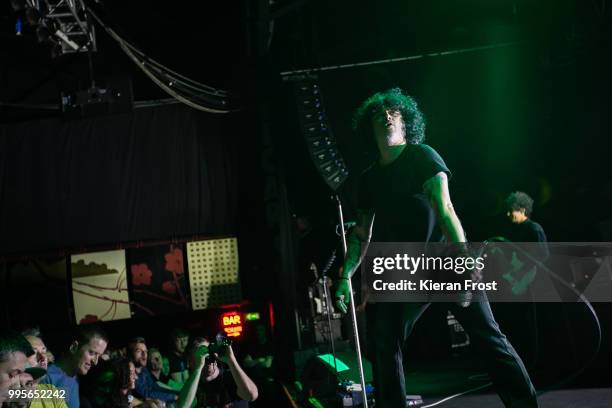 Cedric Bixler and Keeley Davis of At The Drive In perform at Vicar Street on July 10, 2018 in Dublin, Ireland.