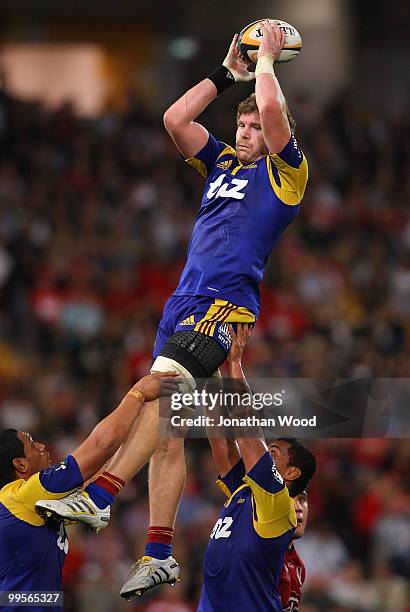 Adam Thomson of the Highlanders wins a lineout during the round 14 Super 14 match between the Reds and the Highlanders at Suncorp Stadium on May 15,...