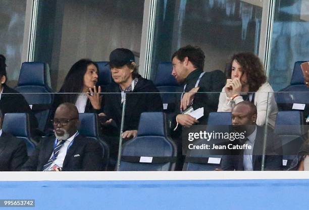 Mick Jagger between his girlfriend Melanie Hamrick and his two sons James Jagger and Lucas Jagger attends the 2018 FIFA World Cup Russia Semi Final...