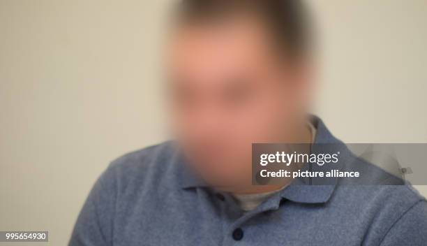 The 32-year-old Italian defendant sits in a court room at the district court Altona in Hamburg, Germany, 28 September 2017. The man is accused of...