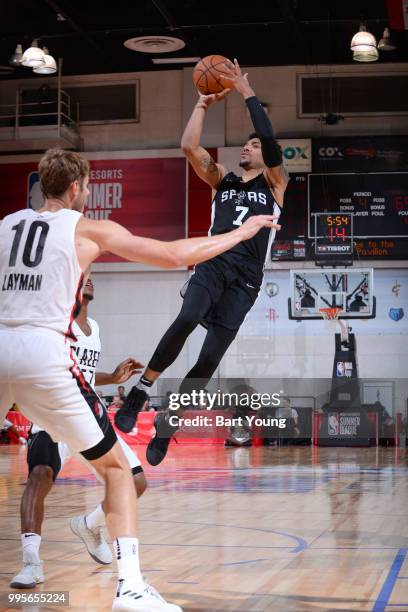 Olivier Hanlan of the San Antonio Spurs shoots the ball against the Portland Trail Blazers during the 2018 Las Vegas Summer League on July 10, 2018...