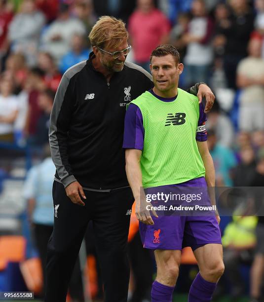 Jurgen Klopp manager of Liverpool with James Milner at the end of the pre-season friendly match between Tranmere Rovers and Liverpool at Prenton Park...