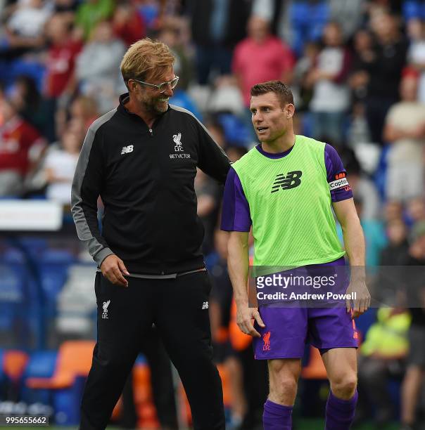 Jurgen Klopp manager of Liverpool with James Milner at the end of the pre-season friendly match between Tranmere Rovers and Liverpool at Prenton Park...