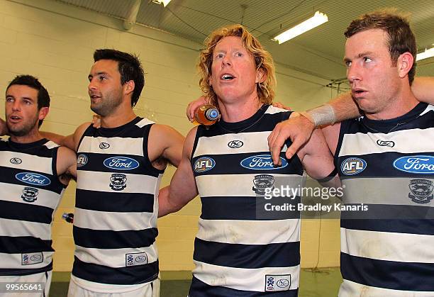Cameron Ling of the Cats celebrates victory with team mates after the round eight AFL match between the Brisbane Lions and the Geelong Cats at The...
