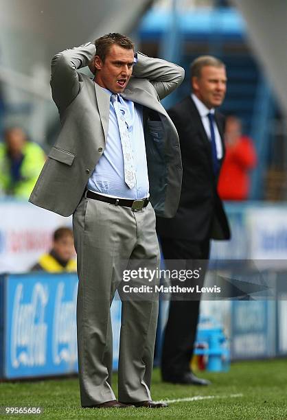 Lee Clark, manager of Huddersfield Town looks on during the Coca-Cola League One Playoff Semi Final 1st Leg match between Huddersfield Town and...