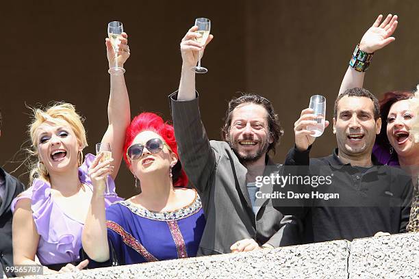 Julie Atlas Muz, Dirty Martini and Mathieu Amalric watch the "You Will Meet A Tall Dark Stranger" Photocall at the Palais des Festivals during the...