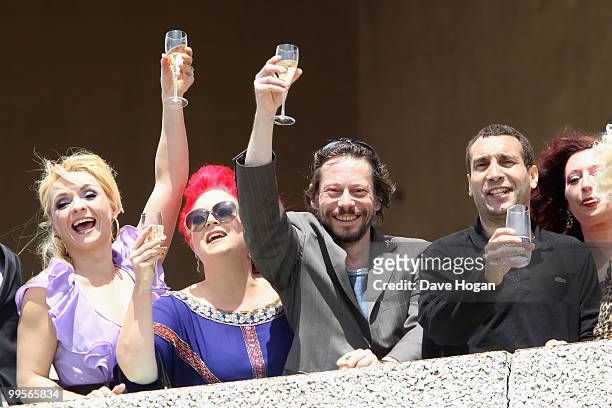 Julie Atlas Muz, Dirty Martini and Mathieu Amalric watch the "You Will Meet A Tall Dark Stranger" Photocall at the Palais des Festivals during the...