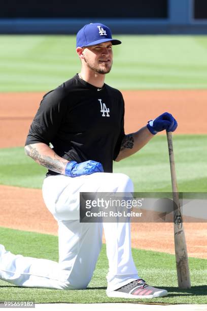 Yasmani Grandal of the Los Angeles Dodgers looks on before the game against the Chicago Cubs at Dodger Stadium on June 27, 2018 in Los Angeles,...