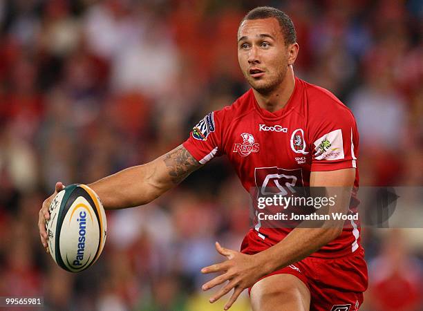 Quade Cooper of the Reds in attack during the round 14 Super 14 match between the Reds and the Highlanders at Suncorp Stadium on May 15, 2010 in...