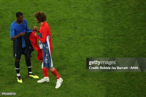 Manchester United teammates Paul Pogba of France and Marouane Fellaini of Belgium at full time during the 2018 FIFA World Cup Russia Semi Final match...
