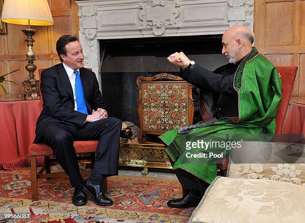 Prime Minister David Cameron holds talks with Aghan President Hamid Karzai, at Chequers, on May 15, 2010 in Ellesborough, England. The talks,...