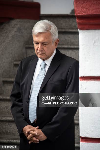 Mexico's President-elect Andres Manuel Lopez Obrador listens to his future Foreign Secretary Marcelo Ebrard after announcing the visit of three US...