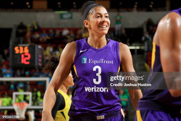 Candace Parker of the Los Angeles Sparks looks on during the game against the Seattle Storm on July 10, 2018 at Key Arena in Seattle, Washington....