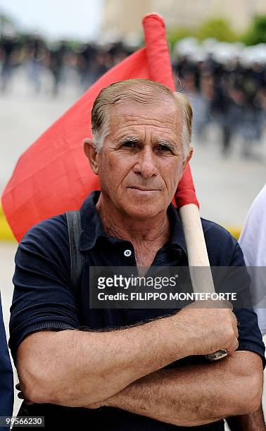 Communist demonstrator of the KKE stands in front of the Greek parliament on May 15, 2010 to protest against the Government. The austerity package...