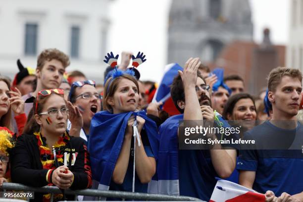 French and Belgian soccer fans attend Belgium National team 'Les Diables Rouges' vs France National Team during FIFA WC 2018 Belgium vs France at...