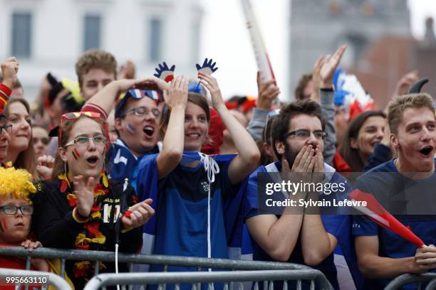 French and Belgian soccer fans attend Belgium National team 'Les Diables Rouges' vs France National Team during FIFA WC 2018 Belgium vs France at...