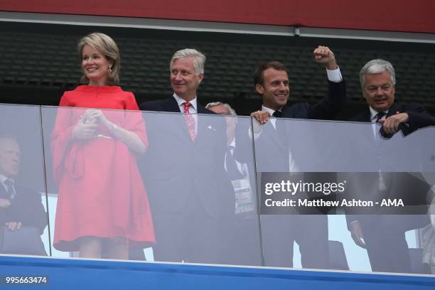 King Philippe of Belgium and his wife, Queen Mathilde stand alongside French President Emmanuel Macron during the 2018 FIFA World Cup Russia Semi...