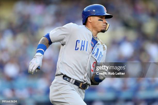 Javier Baez of the Chicago Cubs runs during the game against the Los Angeles Dodgers at Dodger Stadium on June 27, 2018 in Los Angeles, California....