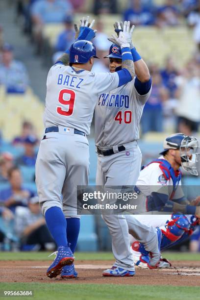 Javier Baez and Wilson Contreras of the Chicago Cubs celebrate during the game against the Los Angeles Dodgers at Dodger Stadium on June 27, 2018 in...