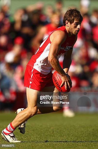Nick Smith of the Swans looks upfield during the round eight AFL match between the Western Bulldogs and the Sydney Swans at Manuka Oval on May 15,...