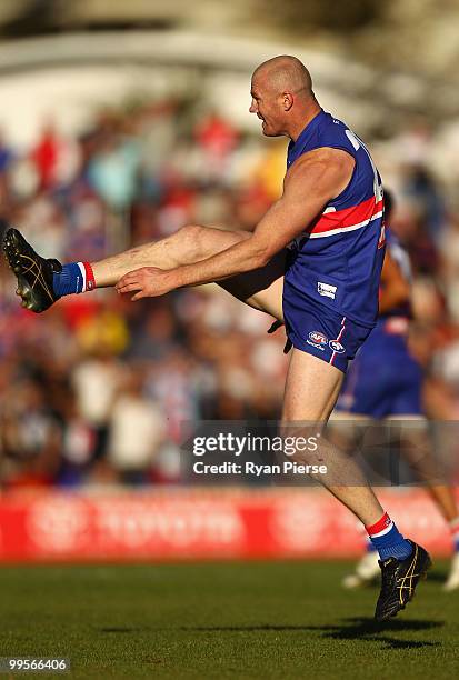 Barry Hall of the Bulldogs kicks during the round eight AFL match between the Western Bulldogs and the Sydney Swans at Manuka Oval on May 15, 2010 in...