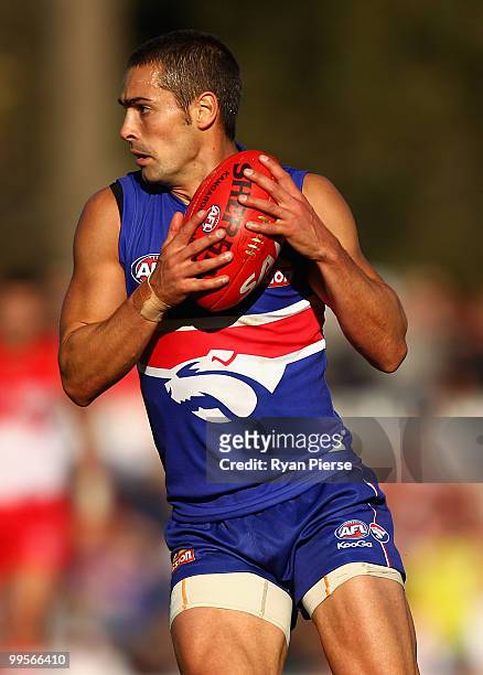 Daniel Giansiracusa of the Bulldogs marks during the round eight AFL match between the Western Bulldogs and the Sydney Swans at Manuka Oval on May...