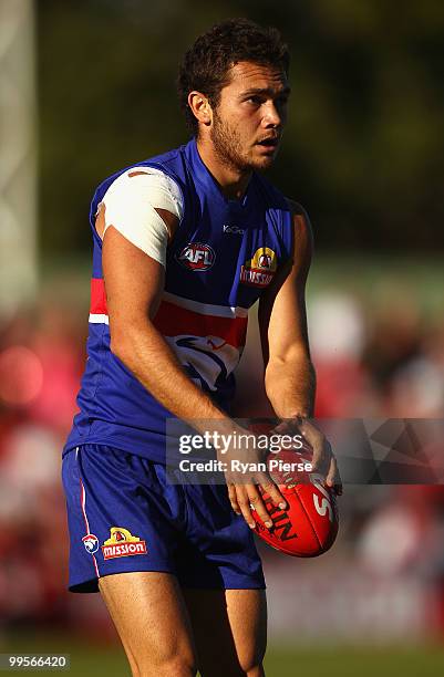 Jarrod Harbrow of the Bulldogs looks upfield during the round eight AFL match between the Western Bulldogs and the Sydney Swans at Manuka Oval on May...