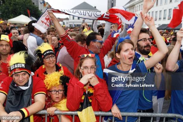 French soccer fans celebrate France winning after attending Belgium National team 'Les Diables Rouges' vs France National Team during FIFA WC 2018...